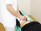 腰と背中の超音波治療器での施術